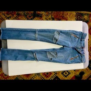 Girls Tommy Hilfiger cut up jeans